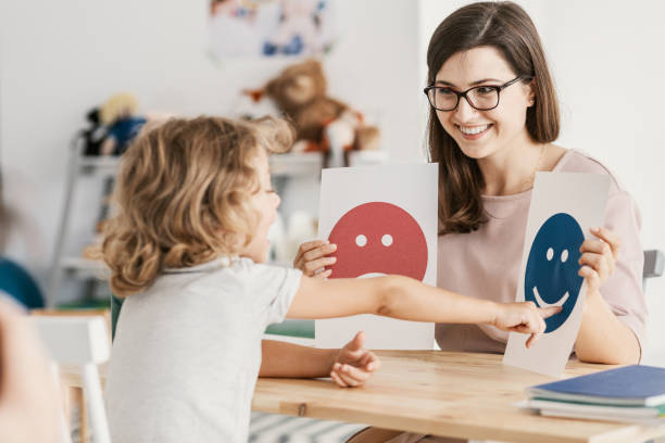 A therapist helping a child name and understand their feelings